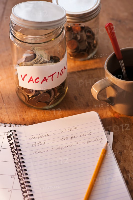 Close up of jar with money for vacations. Photo: Daniel Grill