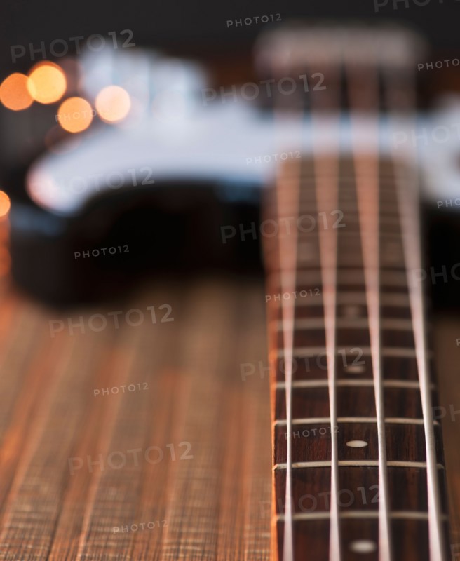 Close up of strings of bass guitar. Photo: Daniel Grill