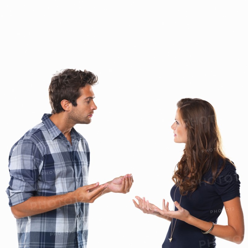 Studio shot of young couple arguing. Photo: momentimages