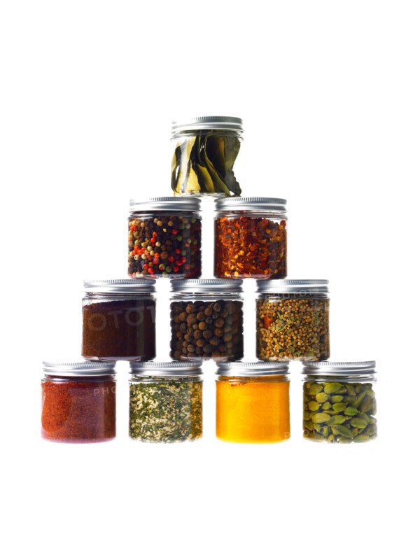 Studio shot of jars with spices. Photo : David Arky