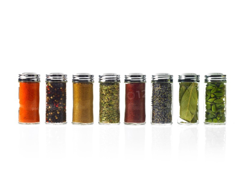 Studio shot of row of jars with spices. Photo: David Arky