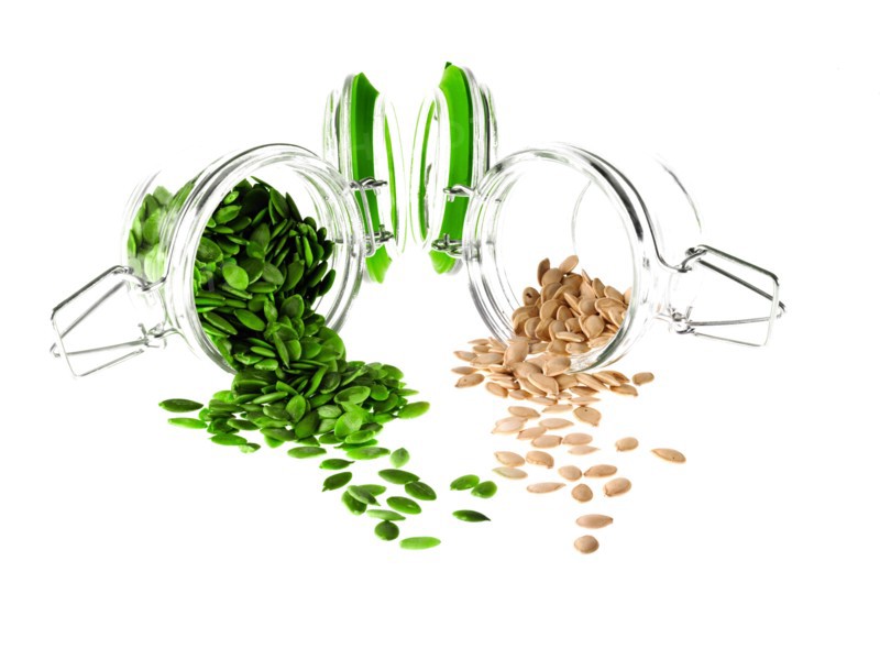 Studio shot of jars with Mixed Seeds on white background. Photo : David Arky
