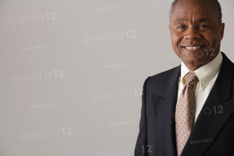Portrait of mature businessman, studio shot. Photo : Rob Lewine