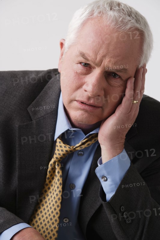 Portrait of senior businessman, studio shot. Photo: Rob Lewine
