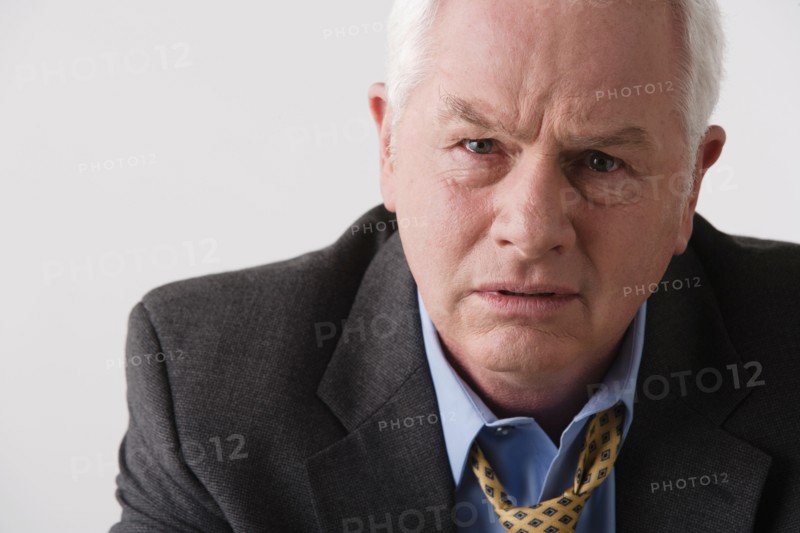Portrait of senior businessman, studio shot. Photo: Rob Lewine