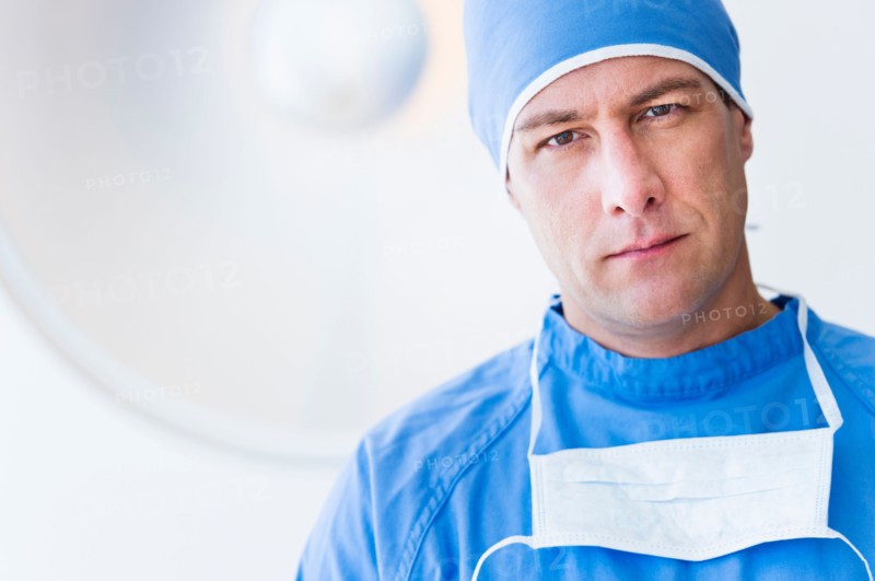 Portrait of male surgeon in operating room.