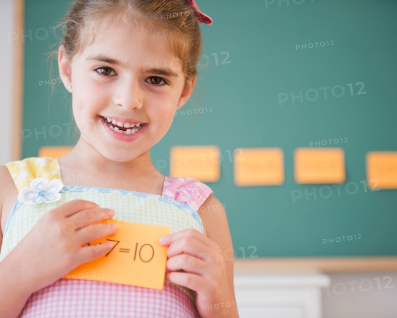 Portrait of smiling schoolgirl ( 6-7). Photo: Jamie Grill