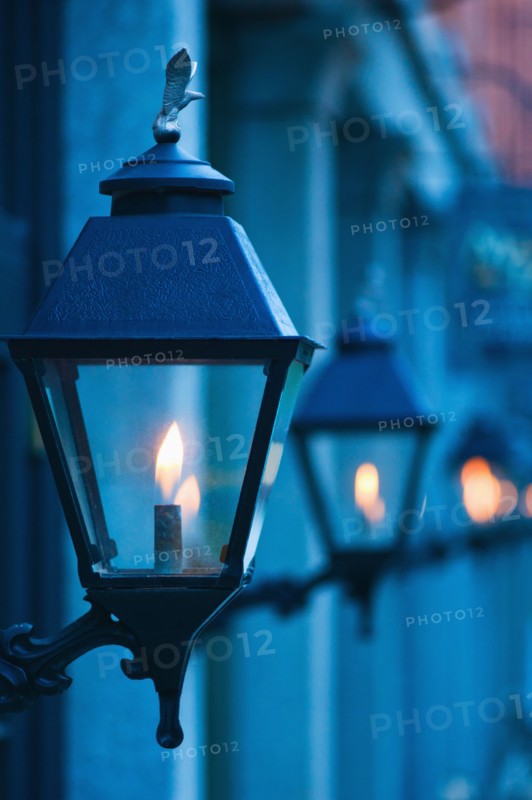 USA, Georgia, Savannah, Close up of gas street lamps at dusk.