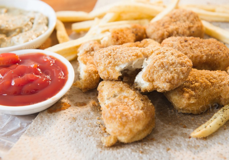 Close up of fried chicken fingers. Photo : Jamie Grill
