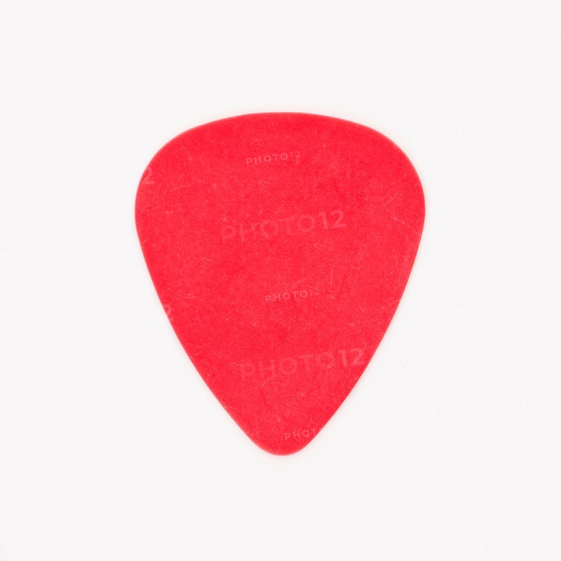 Close-up of guitar pick, studio shot. Photo : Daniel Grill