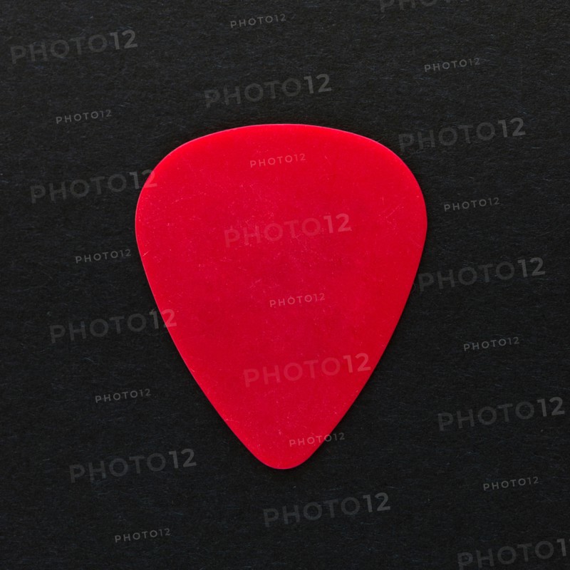 Close-up of guitar pick, studio shot. Photo: Daniel Grill