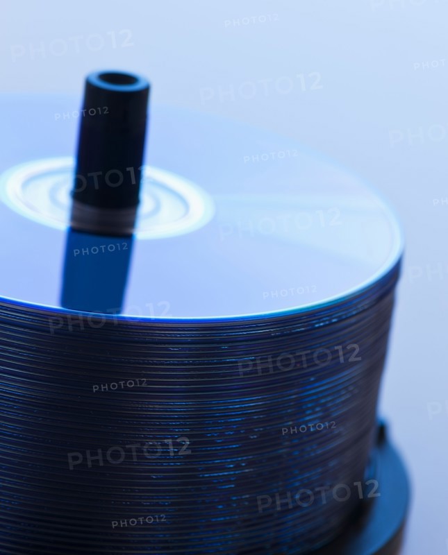 Stack of CDs, studio shot. Photo : Daniel Grill