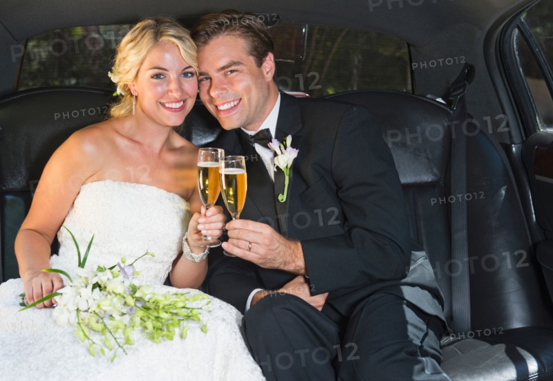 Married couple in limousine.