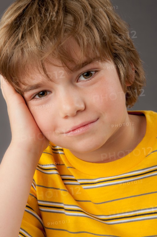 Studio portrait of boy (8-9). Photo: Rob Lewine