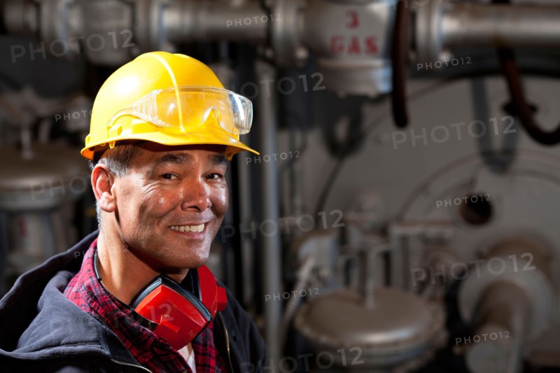 Portrait of male manual worker wearing hardhat. Photo: db2stock