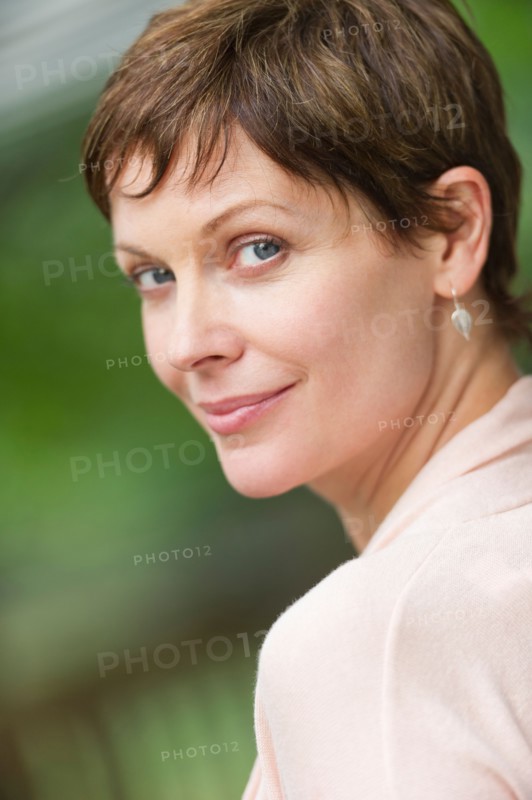 Portrait of mature woman smiling.