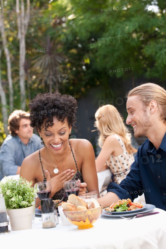Couple dining in outdoor restaurant. Photo : Rob Lewine