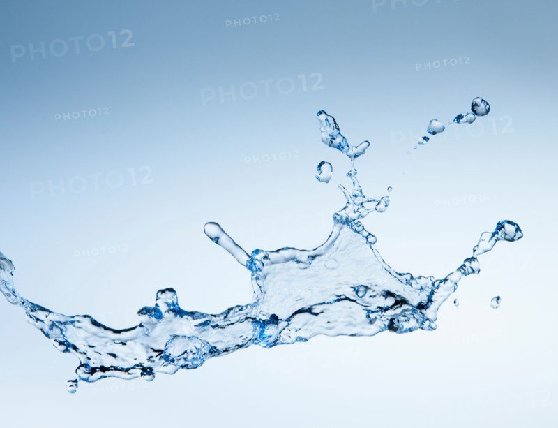 Studio shot of water splash on blue background.