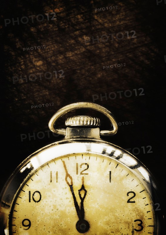 Old-fashioned pocket watch, studio shot.