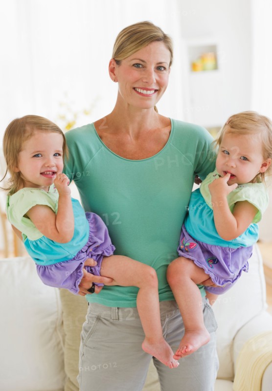 Portrait of mother with daughters (2-3).