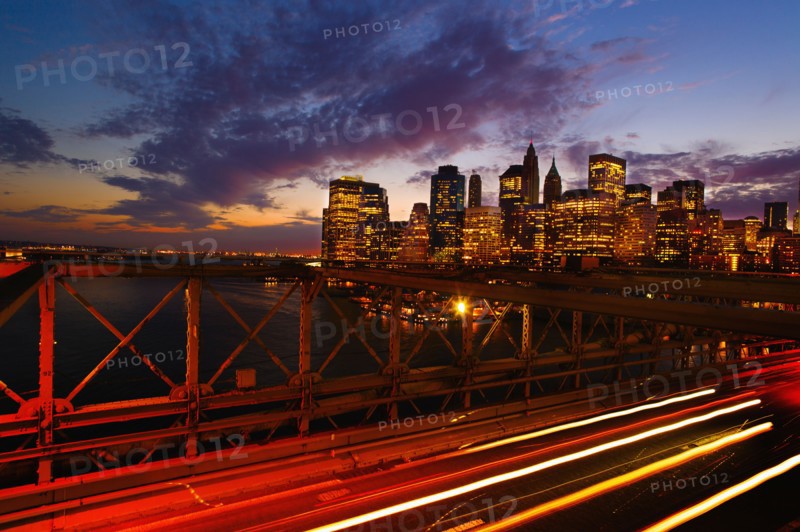 USA, New York State, New York City, Lower Manhattan and Brooklyn Bridge at dusk.