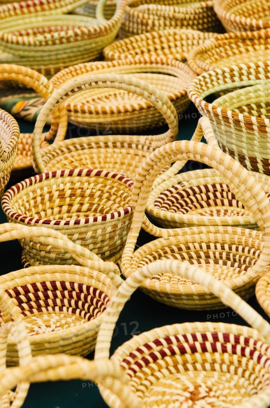 USA, South Carolina, Charleston, Close up of sweetgrass baskets on street market.