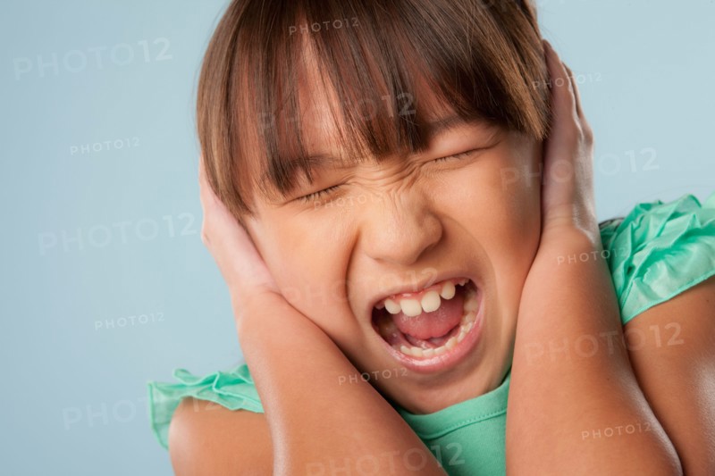 Studio shot of girl (10-11) shouting. Photo: Rob Lewine
