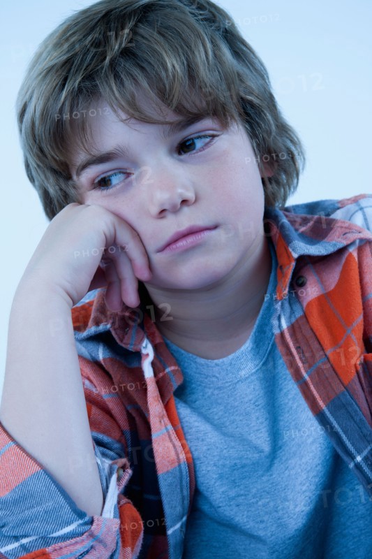 Studio portrait of boy (8-9). Photo: Rob Lewine