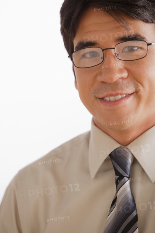 Portrait of business man smiling. Photo : Rob Lewine