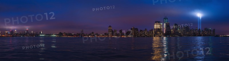 Panorama of New York at night with tribute in light.