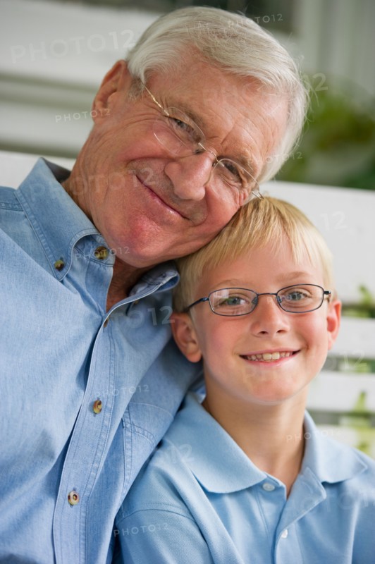 Portrait of grandfather and grandson (10-11).