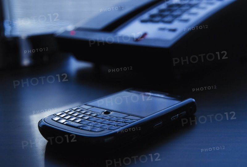 Smart phone on desk.