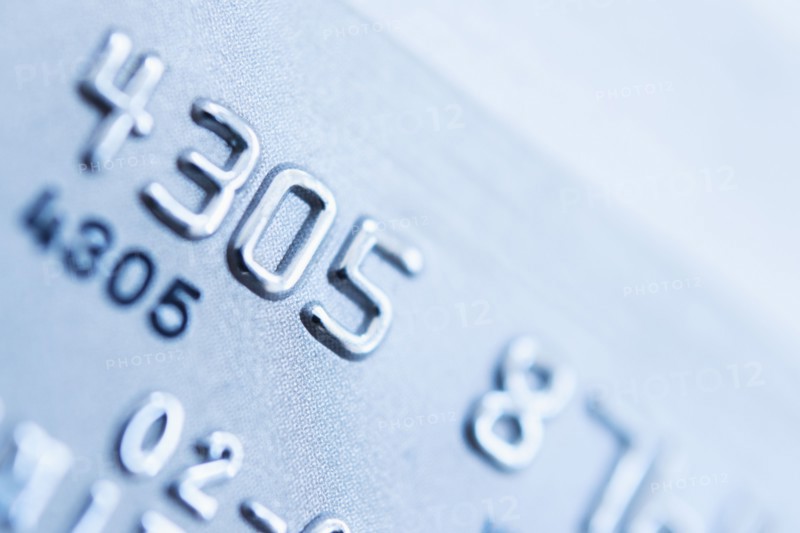 Detail of credit card, studio shot.