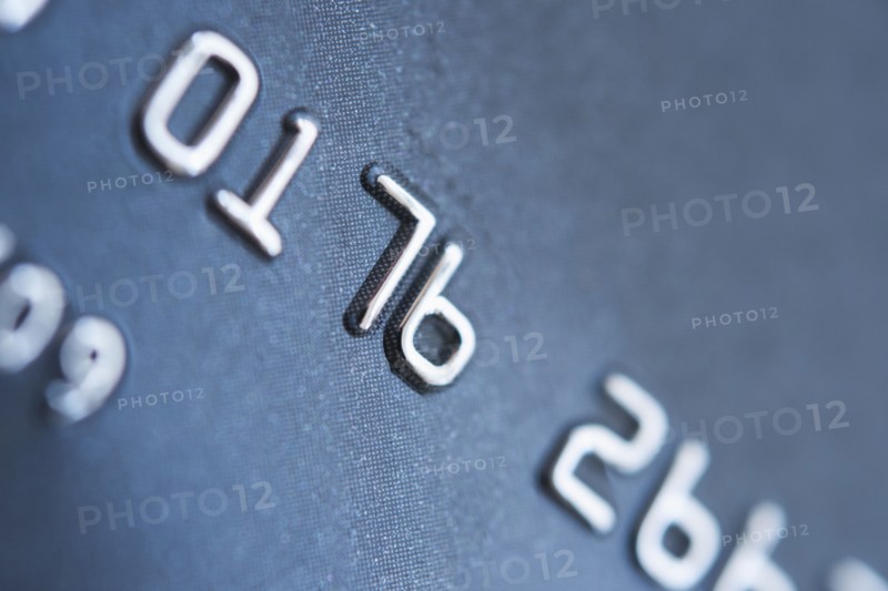 Detail of credit card, studio shot.