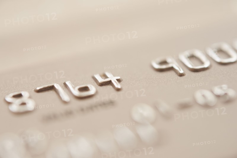 Detail of credit card, studio shot.