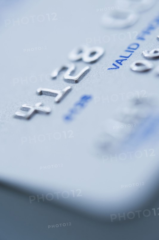 Detail of credit card, studio shot.