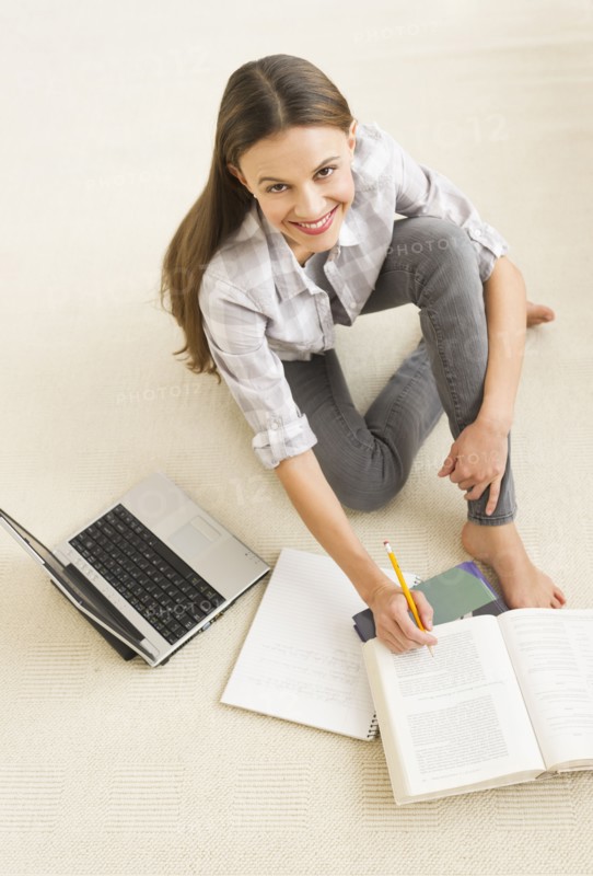 Woman studying at home.