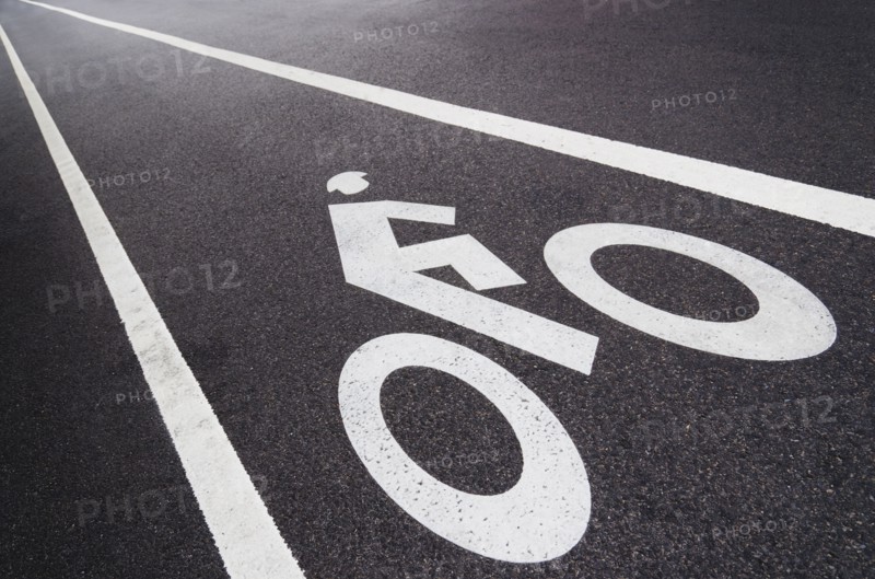 Sign on bike lane.