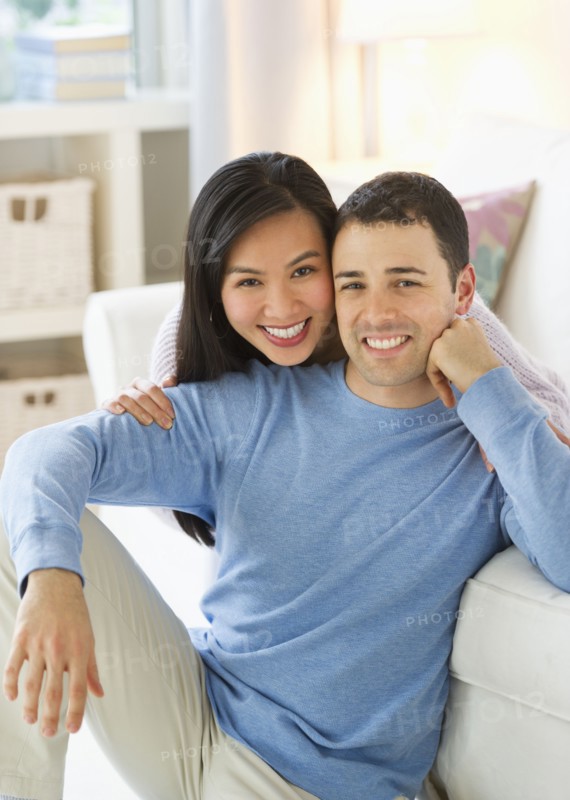 Couple relaxing at home.