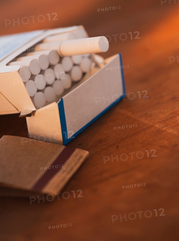 Close up of open cigarette pack and matches. Photo: Daniel Grill