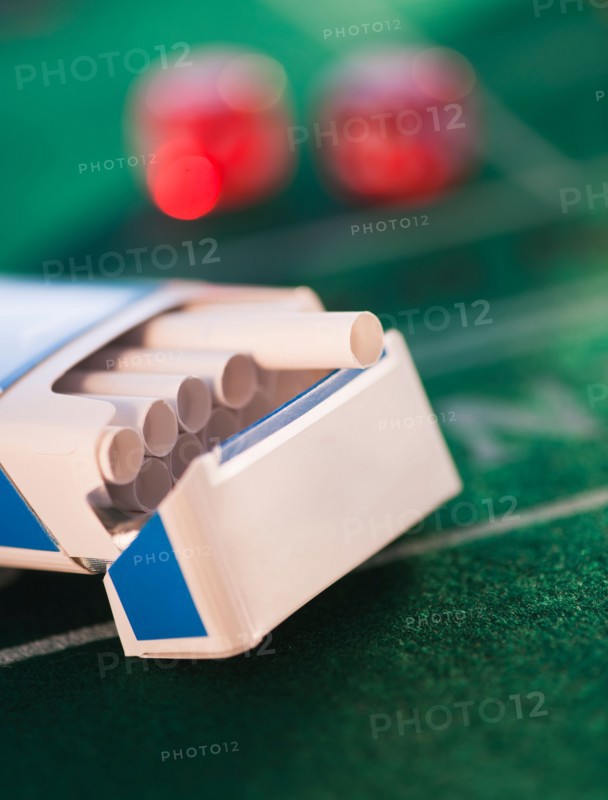 Close up of open cigarette pack on casino table. Photo: Daniel Grill