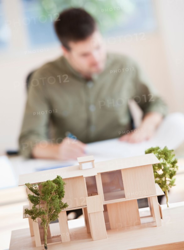 Portrait of architect working in office. Photo : Daniel Grill