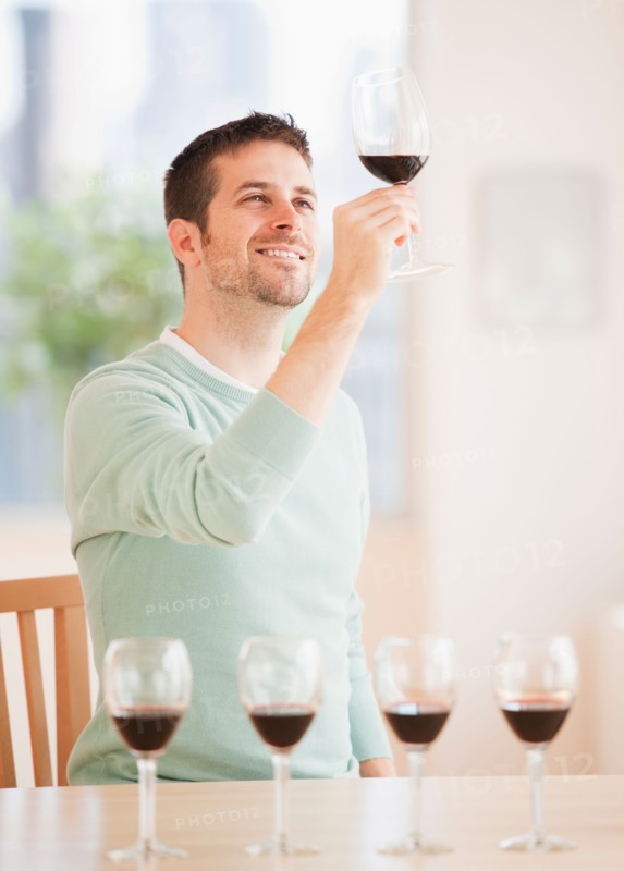 Man tasting wine. Photo : Daniel Grill