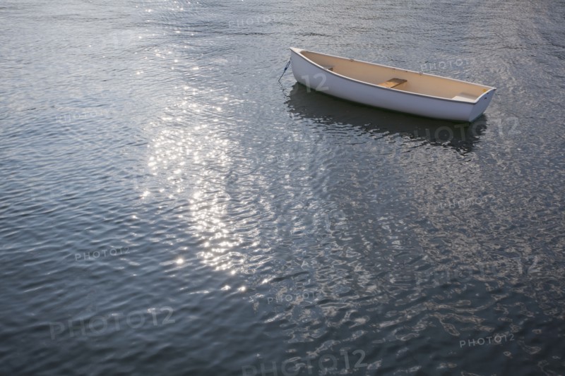 Rhode Island, Lonely rowing boat on water. Photo : Johannes Kroemer