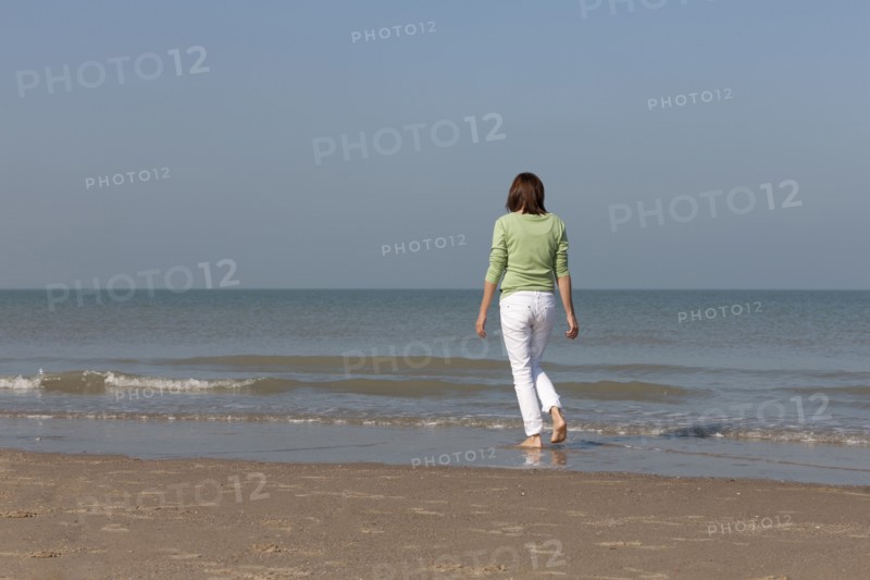 Woman on beach. Photo: Jan Scherders