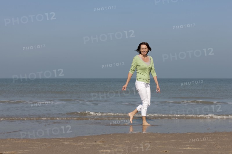 Woman on beach. Photo: Jan Scherders