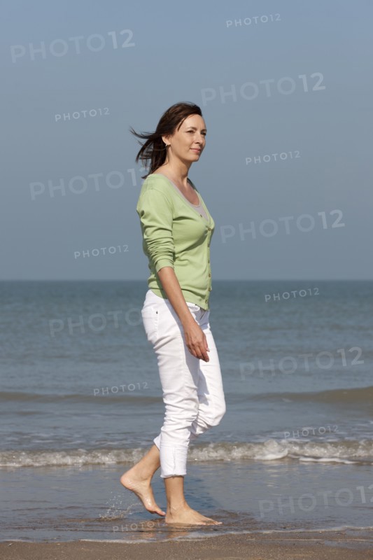 Woman on beach. Photo: Jan Scherders