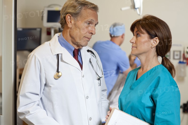 Doctors looking at each other. Photo: db2stock