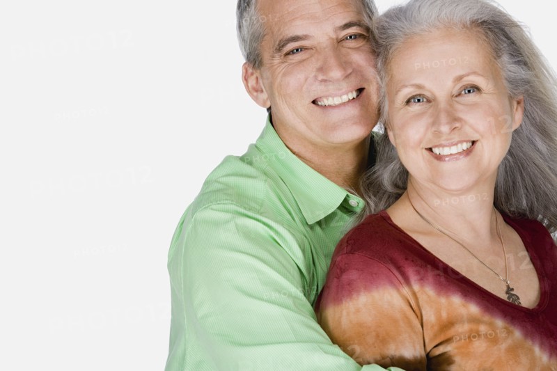 Studio portrait of mature couple. Photo : Rob Lewine