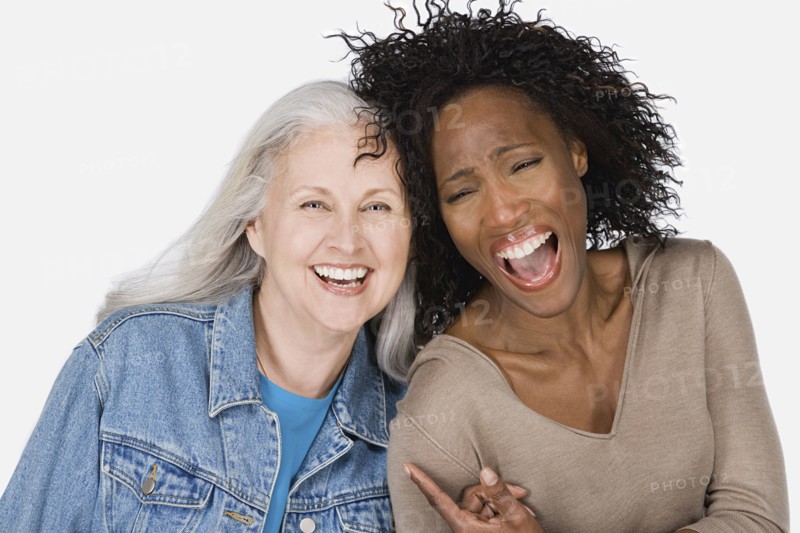 Studio portrait of two mature women. Photo: Rob Lewine